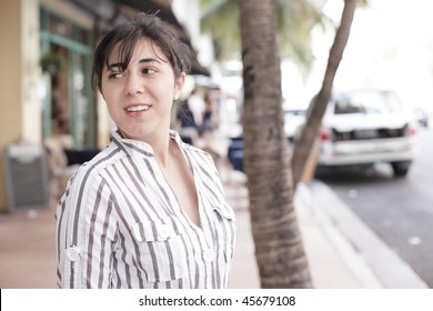 Attractive woman looking over her shoulder