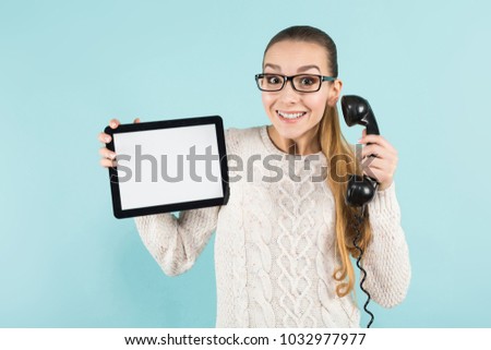 Attractive woman with ponytail and tablet