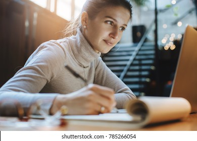 Attractive Woman Reading Good News From Business Partners On Laptop