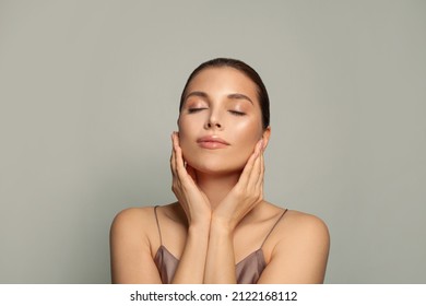 Attractive woman relaxing. Spa model with healthy skin and closed eyes - Shutterstock ID 2122168112