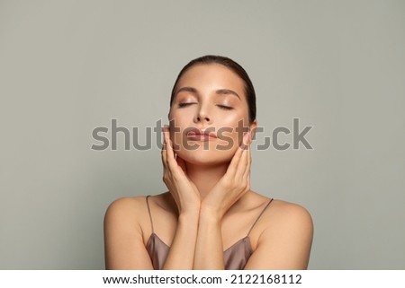 Attractive woman relaxing. Spa model with healthy skin and closed eyes 商業照片 © 