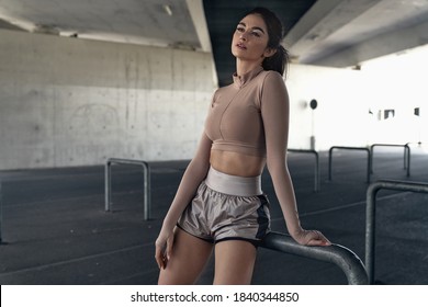 Attractive Woman Resting After Tough Training