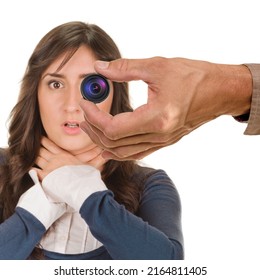 Attractive woman showing asphyxiate painful strangle while man holding mini spy camera