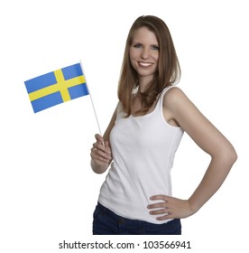 Attractive woman shows flag of Sweden and smiles in front of white background