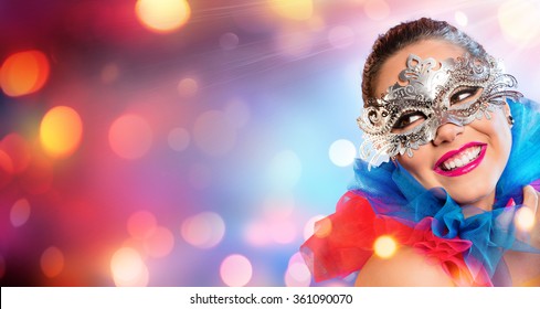 Attractive Woman Smiling With Carnival Mask
