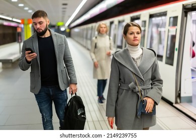 Attractive Woman Walks On The Subway Station