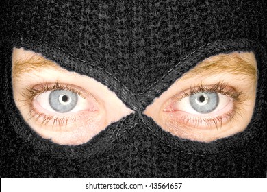 an attractive woman wearing a balaclava. - Powered by Shutterstock