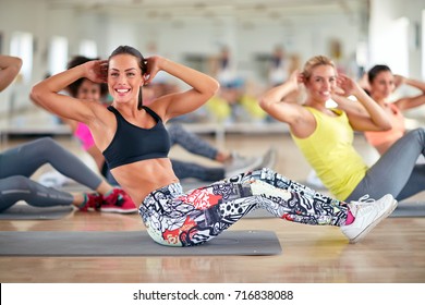 Attractive Women Train In Group On Fitness Class