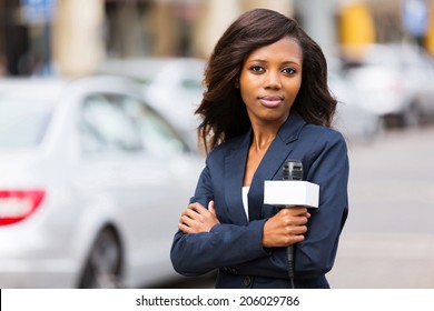 Attractive Young African Female News Reporter 