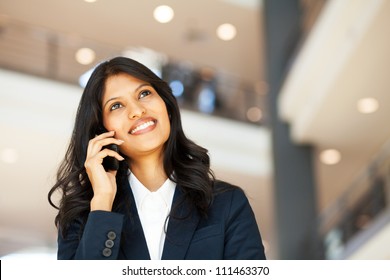 Attractive Young Asian Businesswoman Talking On Mobile Phone