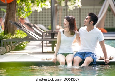 Attractive Young Asian Couple At A Resort