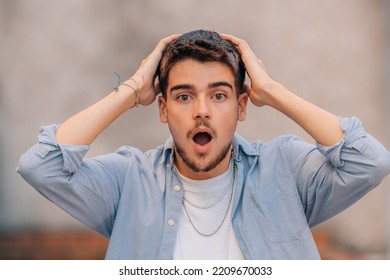 Attractive Young Bearded Caucasian Man In The Street With Surprised Expression