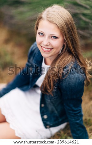 Similar – Pretty blonde girl with fur coat