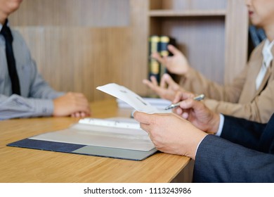 Attractive young business woman in a job interview with a corporate personnel manager - Shutterstock ID 1113243986