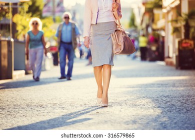 Attractive Young Business Woman Walking In The City