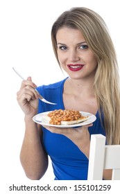 Attractive Young Caucasian Blonde Woman Eating A Meal Of Baked Beans On Toast, Isolated On White, Happy And Confident