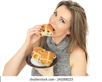 Attractive Young Caucasian Woman, With Brunette Hair, Eating Traditional Easter Celebration Hot Cross Buns, Isolated On White With Copy Space