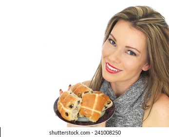 Attractive Young Caucasian Woman, With Brunette Hair, Eating Traditional Easter Celebration Hot Cross Buns, Isolated On White With Copy Space