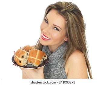 Attractive Young Caucasian Woman, With Brunette Hair, Eating Traditional Easter Celebration Hot Cross Buns, Isolated On White With Copy Space