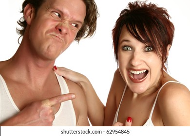 Attractive Young Couple With Different Emotions. Man Angry Woman Laughing.  Over White Background.