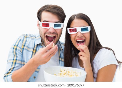 Attractive Young Couple Watching A 3d Movie On White Background