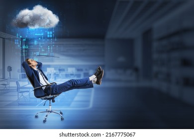 Attractive young european businessman with hands behind head relaxing in swivel-chair in blurry office interior with abstract hologram raining cloud and mock up place for your advertisement. 