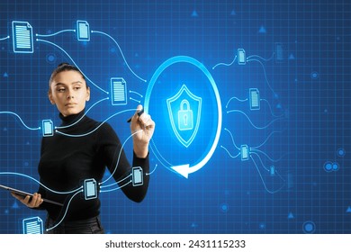 Attractive young european woman using glowing padlock shield hologram on blurry blue background. Safety, web protection and antivirus concept