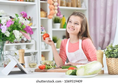 Attractive Young Girl Cooking 