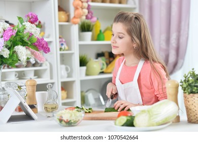 Attractive Young Girl Cooking 