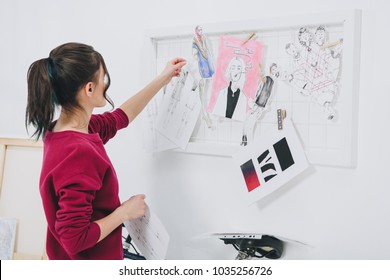 Attractive young girl in stylish clothes by mood board - Powered by Shutterstock