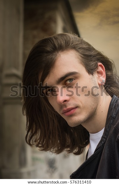 Attractive Young Man Long Hair Blue Stock Photo Edit Now 576311410
