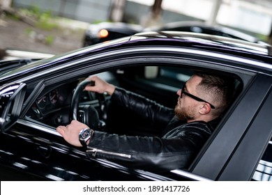 Attractive Young Man Near Car. Attractive Elegant Serious Man Near Good Car. Macho Man In Luxury Auto. Selective Focus.