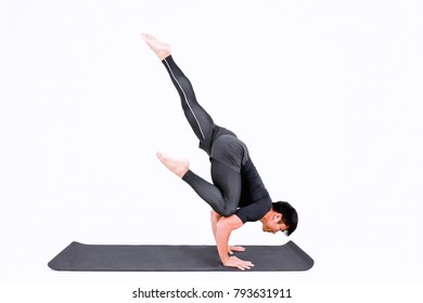 Attractive Young Man practicing advanced yoga on white background. A series of yoga poses. for good health. Sport, meditation and lifestyle concept. Peaceful Meditation for good health. 