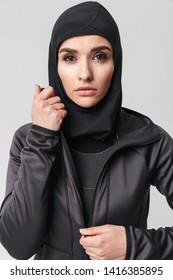 Attractive Young Muslim Woman Wearing Sport Hijab Isolated Over White Background