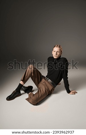 Similar – Image, Stock Photo Charming non binary looking through ring lamp near eyeshadow