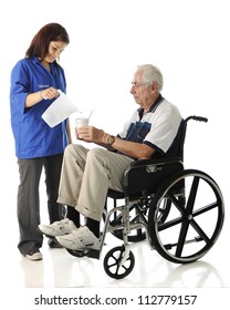 An Attractive Young Volunteer Pouring A Drink For An Elderly Man In A Wheel Chair.  On A White Background.