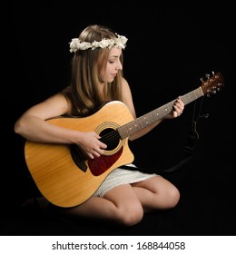 Attractive Young Woman With Acoustic Guitar