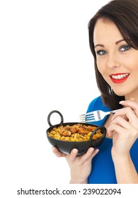 Attractive Young Woman Eating Chicken Tikka Biryani