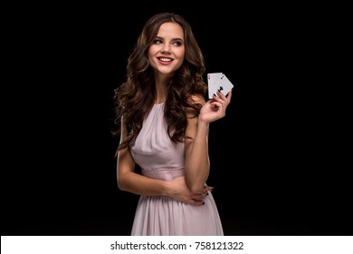 Attractive Young Woman Holding The Winning Combination Of Poker Cards