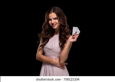 Attractive Young Woman Holding The Winning Combination Of Poker Cards