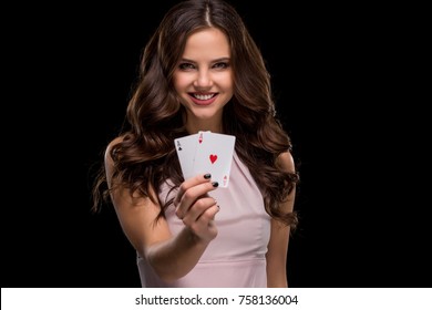 Attractive Young Woman Holding The Winning Combination Of Poker Cards