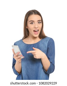 Attractive young woman using mobile phone on white background - Shutterstock ID 1082029229