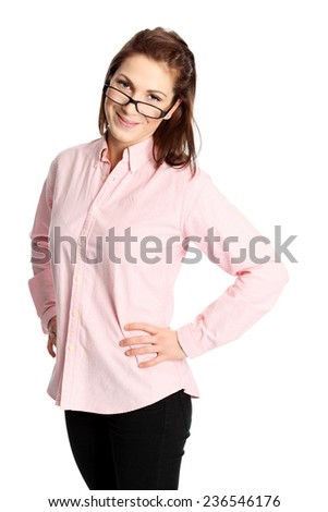 An attractive young woman wearing a pink shirt with glasses holding a blank book. White background.