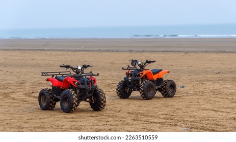 ATV parked on the Seashore. These Vehicles are used for Tourists' enjoyment.