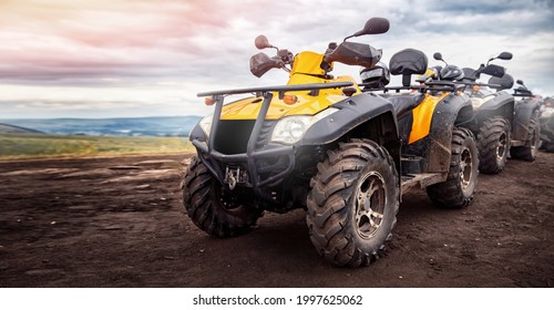 ATV quad bike on forest offroad. Concept banner motocross quadricycle trip background.
