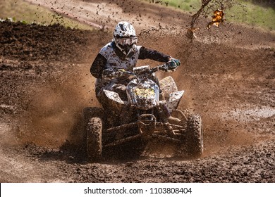 ATV Rider In The Mud