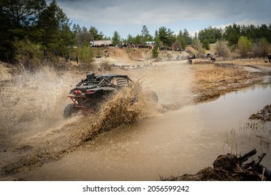 ATV, UTV, 4x4 Off-road Vehicle In Muddy Water