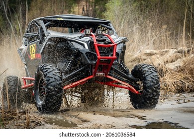 ATV, UTV, 4x4 Off-road Vehicle In Muddy Water