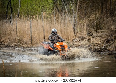 ATV, UTV, All Wheel Drive In Muddy Water