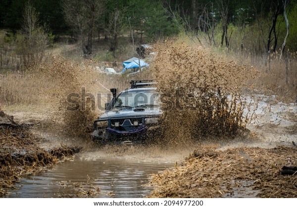ATV and UTV offroad vehicle in water hard road.\
Extreme, adrenalin. 4x4.